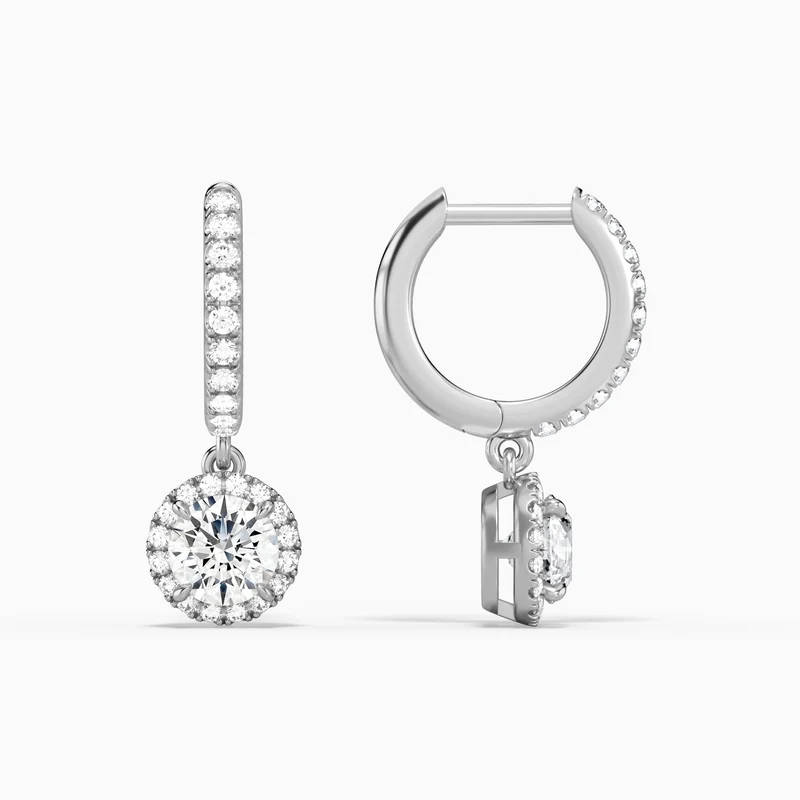 Collection of lab-grown diamond studs, hoops, and drop earrings in 14K gold